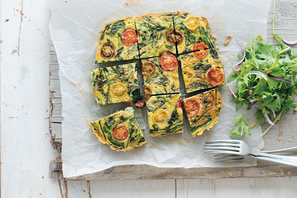 Tortilla de tomates cerises, jeunes épinards et ricotta